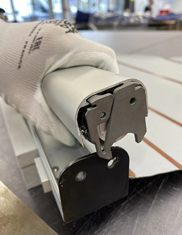 3d-printed-titanium-latch-part-lufthansa-attached-roller-shutter